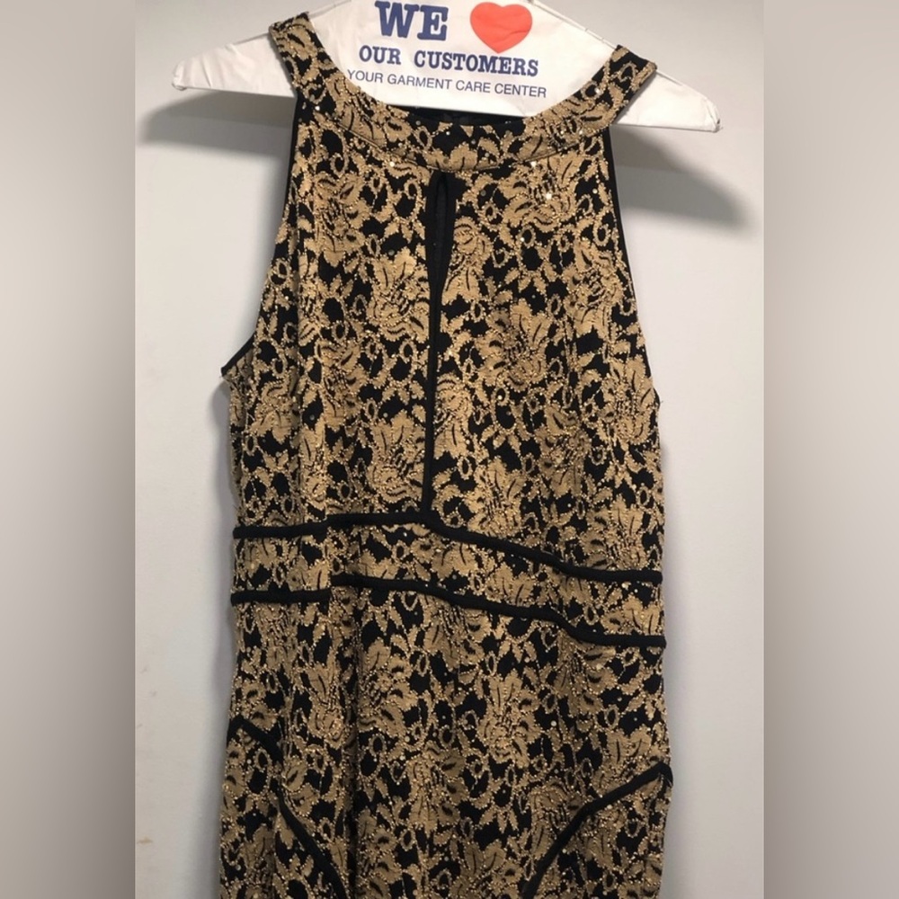 Elegant Black and Gold Party Dress.  Stretch fit.   Size 22W

FREE SHIPPING